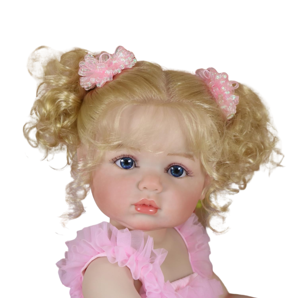 Full view of Aubrey Rose realistic reborn toddler in a pink princess outfit with matching bows and lifelike facial details