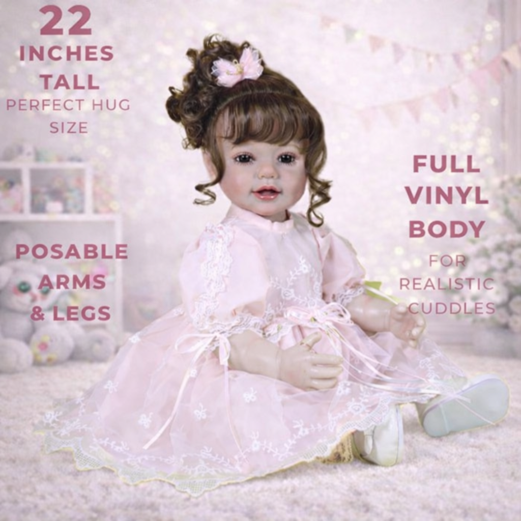 Princess Butterfly 22 inch reborn baby doll with full vinyl body, realistic brown curly hair, and pink lace princess dress.