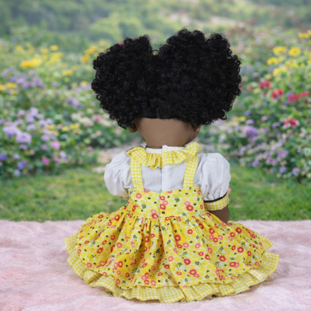 Hand-painted 3D skin details and curly hair of Sunny Mae 22-inch African American lifelike doll
