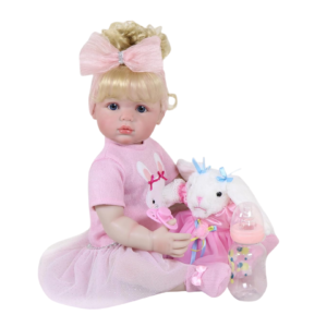 Ellie Mae toddler doll sitting with plush bunny, baby bottle, and pacifier in pink outfit