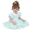 Happy Birthday Girl reborn doll wearing mint green dress full body sitting pose isolated on white background