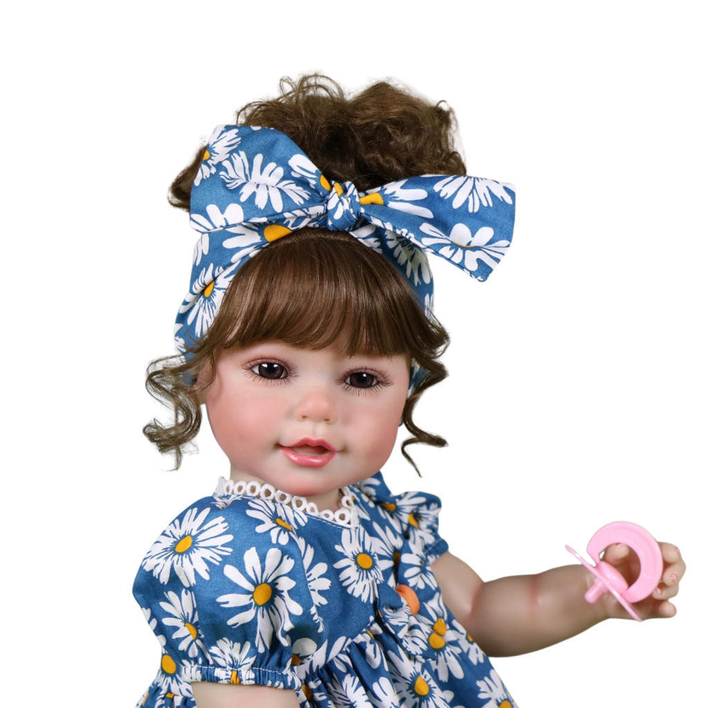 Close-up Sweet Dreams Daisy reborn baby doll with brown hair soft curls and lifelike hand-painted facial details