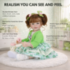 Froggy Girl reborn toddler doll showing hand-painted details, green eyes, and soft vinyl body