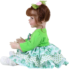 Froggy Girl reborn toddler doll side view showing layered dress and curly brown pigtails
