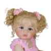 Close up Aubrey Rose reborn doll with blue eyes curly blonde pigtails and detailed hand painted realistic face