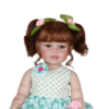 Froggy Girl reborn toddler doll in frog print dress with green eyes and brown pigtails