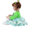 Froggy Girl reborn toddler doll side view showing layered dress and curly brown pigtails