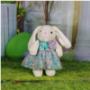 plush bunny toy included with reborn doll matching floral outfit