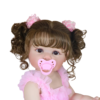 Realistic reborn doll Madison with magnetic pacifier and curly brown pigtails