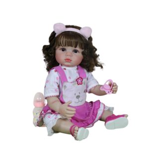 22 inch reborn baby doll Purrfectly Kitty sitting with kitty outfit and baby bottle