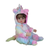 Realistic reborn baby doll in rainbow unicorn onesie with hood and pacifier, full body sitting pose