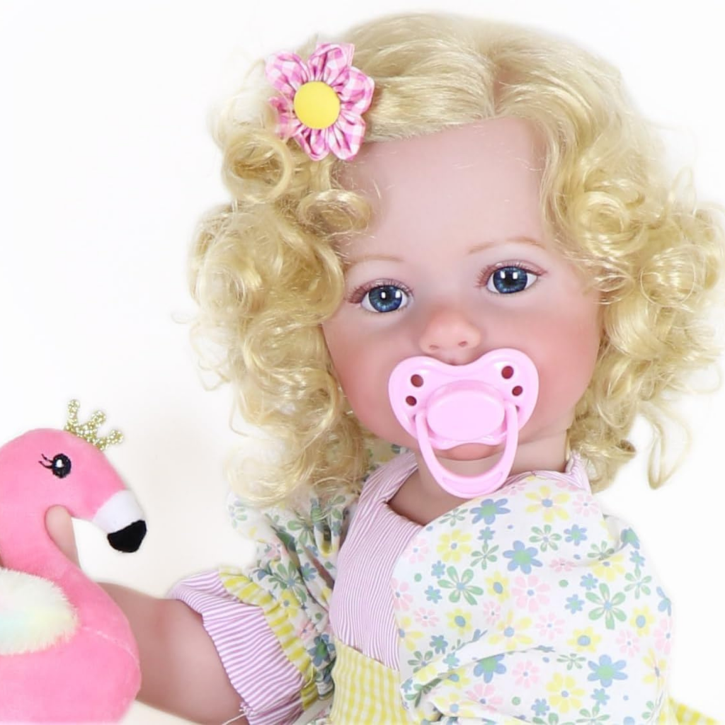 Sunny Flamingo Girl reborn doll with magnetic pacifier blonde curly hair and realistic baby face details