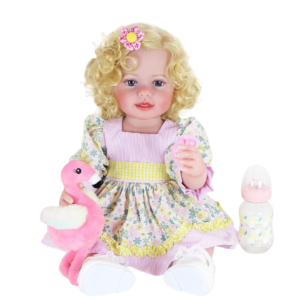 Sunny Flamingo Girl reborn toddler doll full body with flamingo plush and baby bottle accessory isolated on white background