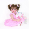 22 inch reborn toddler doll pink dress set with pacifier bunny and bottle