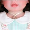 Sweet Curly Sunshine doll close-up of heart necklace with lace collar and soft fabric details