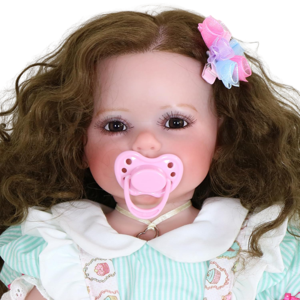 Close-up Sweet Curly Sunshine reborn doll with pink magnetic pacifier and lifelike facial features