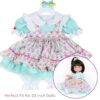 20 to 22 inch doll wearing pastel cupcake ruffle dress outfit with bloomers and matching hair bow
