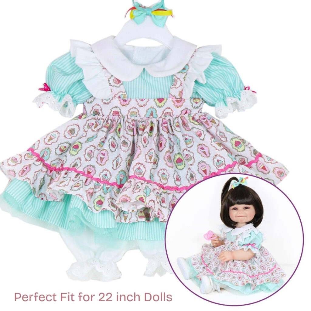 20 to 22 inch doll wearing pastel cupcake ruffle dress outfit with bloomers and matching hair bow