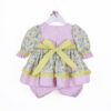 Back view of pastel floral ruffle doll dress with large yellow gingham bow and bloomers