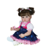 Stella Rae reborn doll angled view highlighting galaxy dress pink trim and realistic toddler features