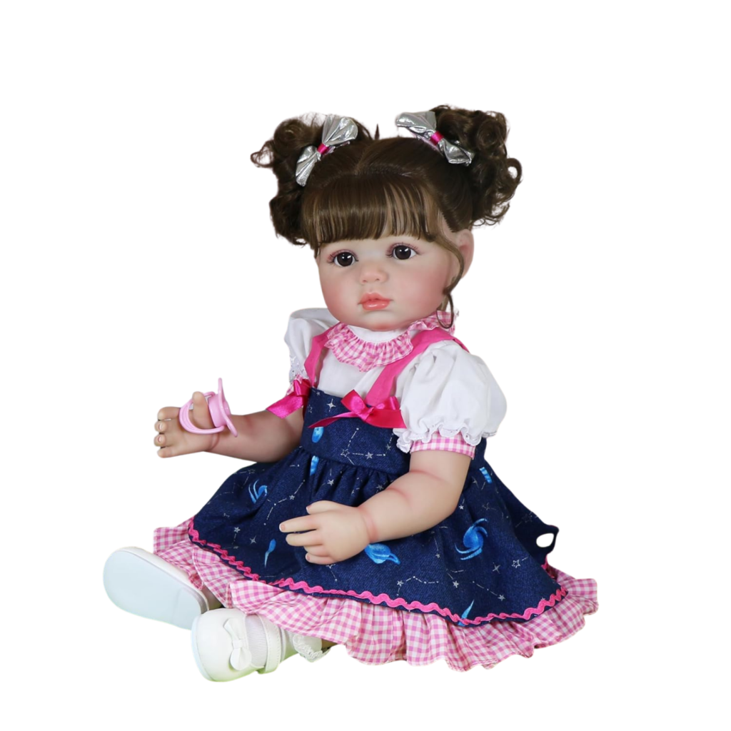 Stella Rae reborn doll angled view highlighting galaxy dress pink trim and realistic toddler features